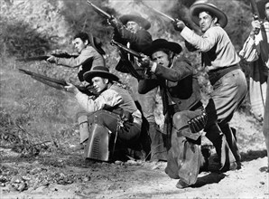 Alfonso Bedoya (standing left), Joe Dominguez (standing center), Frank Cody (kneeling left), Gordon