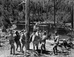 Arthur Kennedy (on horse), on-set of the western film, "Bend Of The River", Universal Pictures,