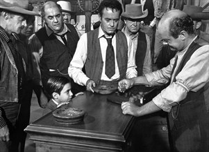 Henry Fonda (center), Robert Middleton (to the left of Fonda), Jean-Michel Michenaud (little boy),