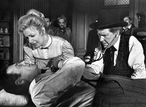 Henry Fonda, Joanne Woodward, Burgess Meredith, on-set of the western film, "A Big Hand For The