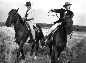 Jason Robards, Kevin McCarthy, on-set of the western film, "A Big Hand For The Little Lady", Warner