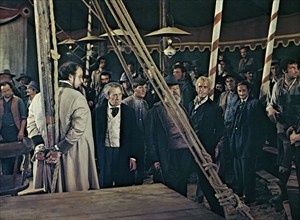 Victor Buono (tied to pole), on-set of the spaghetti western film, "Boot Hill", Italian: "La