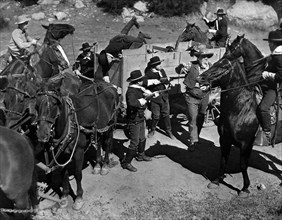 U.S. Cavalry capturing bandit  Richard Alexander, on-set of the western film, "Boss Of Boomtown",