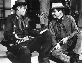 Dan Duryea (left), Peter Duryea (right), on-set of the western film, "The Bounty Killer", Embassy