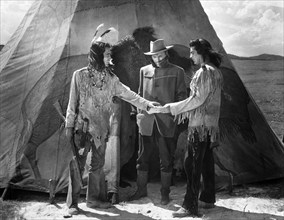 Keith Larson (left), John Lund (center), Victor Mature (right), on-set of the western film, "Chief