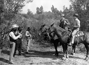 Bud Geary, Jack O'Shea, George Chesebro, Tom London, Jay Kirby, on-set of the western film,