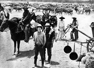 Gary Grimes (foreground, left), Raymond Guth (foreground, right), on-set of the western film, "The