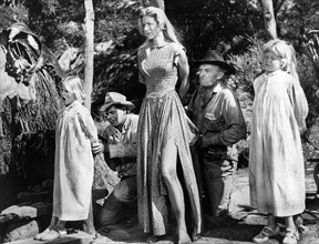 Glenn Ford (kneeling left), Barbara Babcock (standing center, Arthur Kennedy (kneeling right),