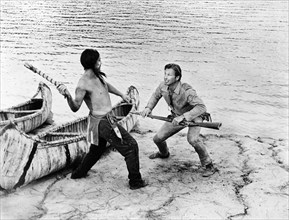 Lex Barker (right), on-set of the western film, "The Deerslayer", 20th Century-Fox, 1957