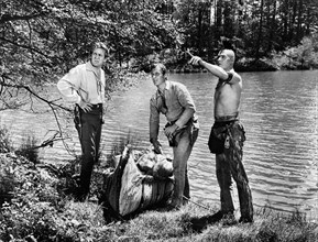 Forrest Tucker, Lex Barker, Carlos Rivas, on-set of the western film, "The Deerslayer", 20th