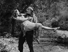 Yvonne De Carlo, Larry Parks, on-set of the western film, "Deerslayer", Republic Pictures, 1943