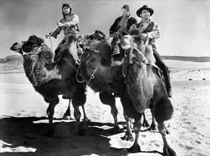 Anthony Caruso, George Tobias, John Doucette, on-set of the western film, "Desert Pursuit",