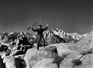 Wayne Morris, on-set of the western film, "Desert Pursuit", Monogram Pictures, 1952