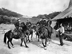 Group of Texas State Police "Bluebellies" on horseback, on-set of the western film, "The