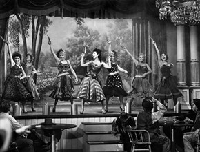 Mari Blanchard (center), on-set of the western film, "Destry", Universal Pictures, 1954