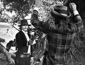 Charles Bronson, on-set of the western film, "From Noon Till Three", United Artists, 1976