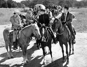 Jim Davis, Ken Mayer, Don Kelly, Nestor Paiva, on-set of the western film, "Frontier Uprising",