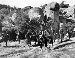 Don Kelly (foreground, center), on-set of the western film, "Frontier Uprising", United Artists,