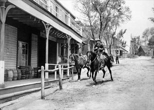 John Derek, on-set of the western film, "Fury At Showdown", United Artists, 1957