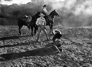 Jack Holt (standing),on-set of the western film, "The Gallant Legion, Republic Pictures, 1948