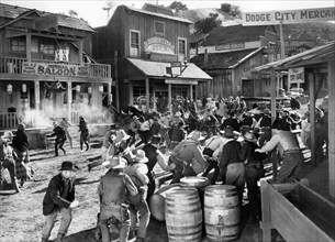 Gunfight and crowd scene, on-set of the western film, "Dodge City", Warner Bros., 1939