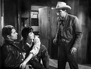 Audie Murphy (left), Susan Cabot, Stephen McNally (right), on-set of the western film, "The Duel At