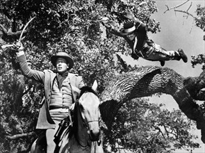 Joel McCrea (on horse), on-set of the western film, "The First Texan", Allied Artists, 1956