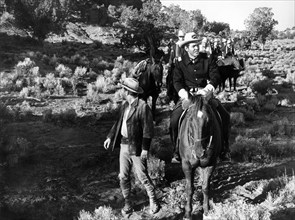 Harry Lauter (standing left), Joe Patridge (right foreground on horse), on-set of the western film,