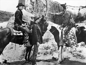 Ben Johnson (on horse), Peter Graves (standing center),  on-set of the western film, "Fort