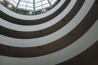 Interior low angle view of spiral ramp, Solomon R. Guggenheim Museum, New York City, New York, USA