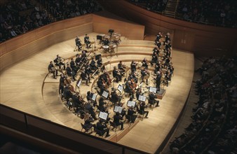 High angle view of Los Angeles Philharmonic Orchestra performing at Walt Disney Concert Hall, Los