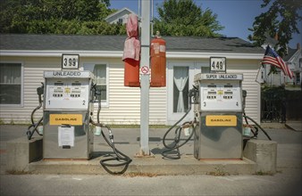 Two gas station fuel pumps with price per gallon, Castine, Maine, USA