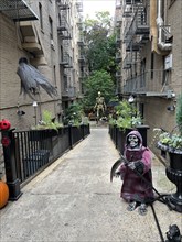 Halloween decorations between two residential buildings, Greenwich Village, New York City, New