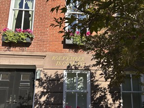 Roevember Is Coming' sign stenciled on residential building exterior, Greenwich Village, New York