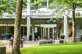 Takeda Pharmaceutical Company, building exterior and outdoor lounge and eating area, Cambridge,