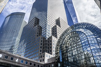 Low angle view of 200 West Street (left), Brookfield Place (foreground), One World Trade Center