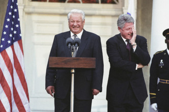 U.S. President Bill Clinton with President Boris Yeltsin of Russia during press conference,