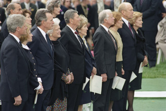 U.S. President Bill Clinton and U.S. First Lady Hillary Rodham Clinton (both far left) attending