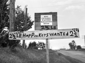 Hop Pickers Wanted sign along highway, Yakima County, Washington, USA, Russell Lee, U.S. Farm