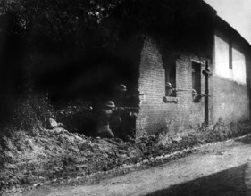 Sharpshooters with good view of enemy from shelter behind old brick wall, 28th Infantry,