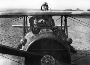 First Lieutenant E. V. "Eddie" Rickenbacker, 94th Aero Squadron, American ace, standing up in his