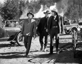 Robert Mitchum, George Kennedy, Dick Peabody, on-set of the western film, "The Good Guys And The