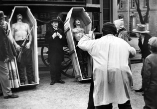 R.G. Robinson (left coffin), Craig Curtis (right coffin), Mel Yoder (undertaker), on-set of the