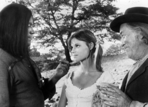 Oliver Reed, Kay Lenz, Strother Martin, on-set of the western film, "The Great Scout And Cathouse