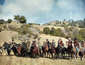 Stewart Granger (center), on-set of the western film, "Gun Glory", MGM, 1957