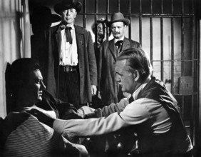 James Arness (foreground left), Frank Fenton (standing left), George DeNormand (foreground right),