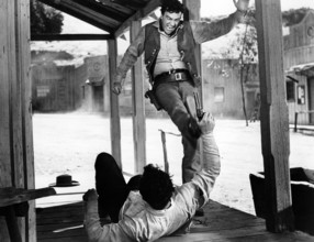 Don Megowan (laying on ground), James Arness, on-set of the western film, "Gun The Man Down",