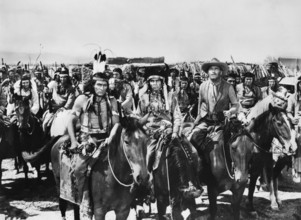 Ray Teal (on horse, right), on-set of the western film, "The Guns Of Fort Petticoat", Columbia