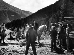 Robert Stack (on horse), on-set of the western film, "Great Day In The Morning", RKO Radio