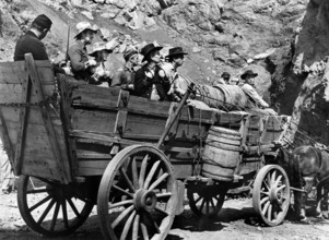 Sterling Hayden (second, left), on-set of the western film, "Hellgate", Commander Films, Lippert